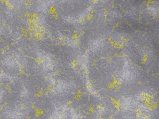 Claystone rock surface with yellow impurities